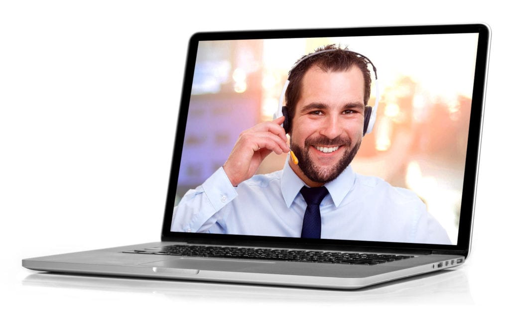 man wearing headphone on screen of laptop