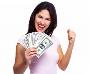 Happy young smiling woman holding cash, isolated over white back